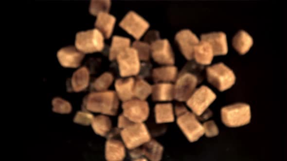 Super Slow Motion Cubes of Cane Sugar Rise Up and Fall