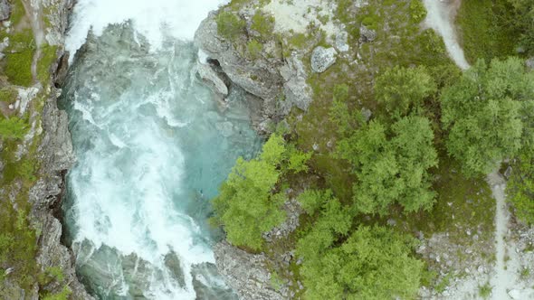 Top View Of The Strong Current Of  Water At The Stryneelva River In Stryn, Norway. aerial