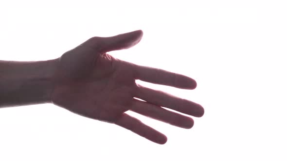 Person does hand gesture with bright white backdrop 38