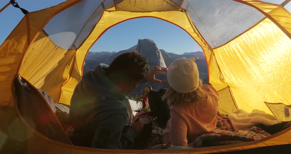 A Hand Heart Made By a Couple, Relaxing in a Tent, Against the View of Half Dome Mountain. Yosemite.