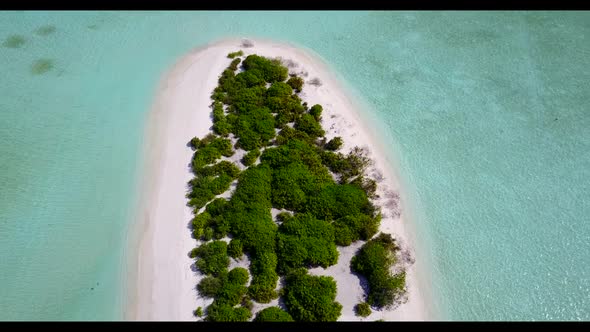 Aerial flying over abstract of tropical coast beach break by transparent lagoon with white sandy bac