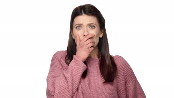 Caucasian Woman Middle Aged Being Shocked with Unexpected News and Covering Open Mouth with Hands in