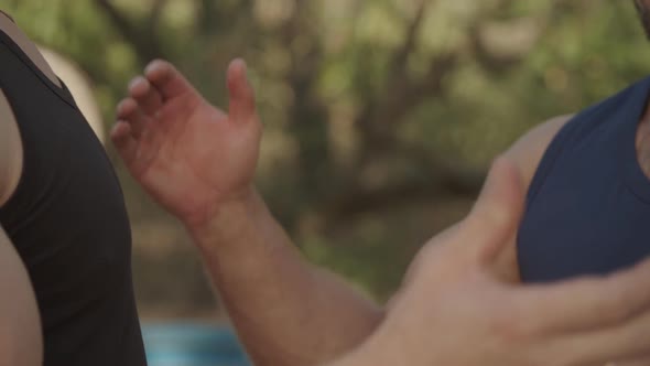 Firm Clasped Handshake of Two Muscular Men's Hands