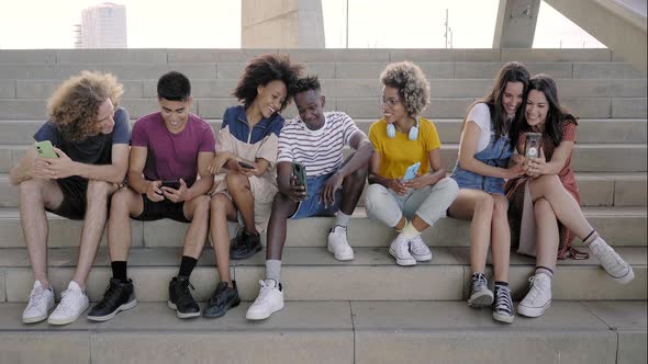 Portrait of a Group of Mixed Race People with Smart Phones