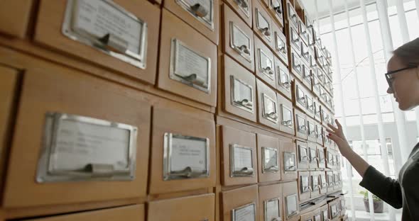 Librarian Opens Library Card Index