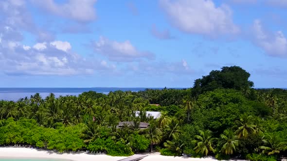 Aerial seascape of resort beach by blue ocean and sand background