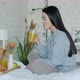 Girl and Guy Eating Breakfast and Talking Smiling in Bed in Apartment - VideoHive Item for Sale