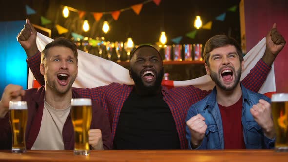 Cheerful Multiracial Fans Cheering for Football Team, Waving English Flag, Hobby