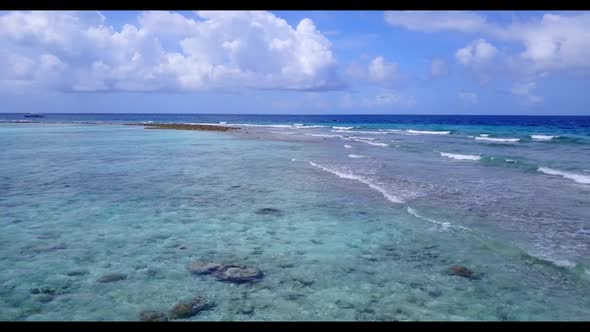 Aerial travel of idyllic resort beach trip by clear lagoon and white sand background of a dayout nea