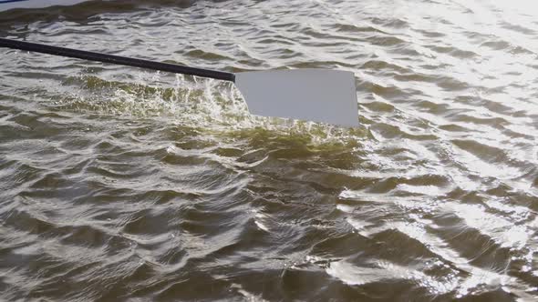 High angle view of oar being used on the lake