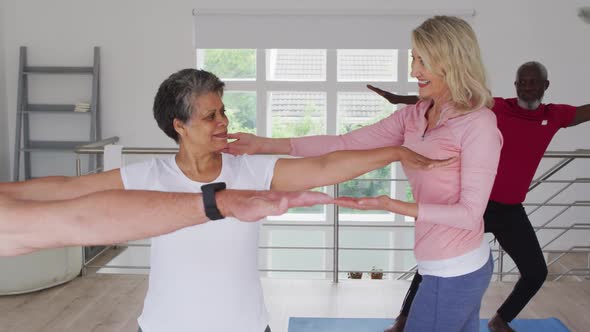 Diverse group of seniors taking part in fitness class