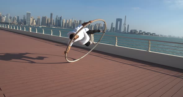 Acrobatic Tricks in a Hoop Performed By a Professional Wheel Gymnast Dubai