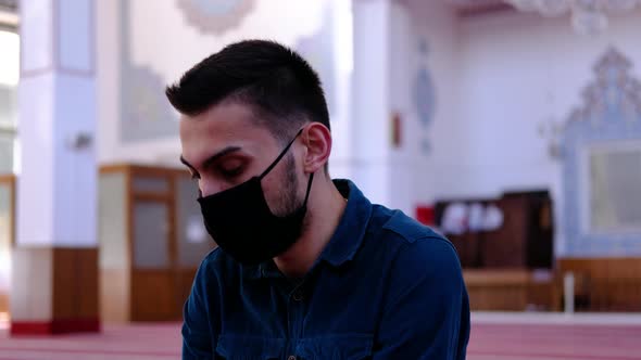 Man Masked Turning His Head Mosque