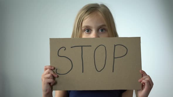 Girl Shows Stop Sign, Social Protection of Children Domestic Violence Prevention