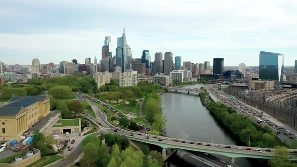 Drone Aerial pan left of Philadelphia city skyline showing Comcast Technology Center and the Art Mus