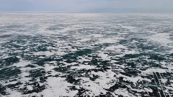 The hovercraft goes on the ice of Baikal. Driving around the lake on the Hivus