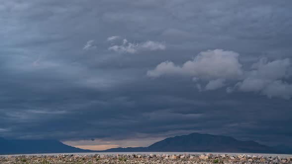 Dark clouds following a rainstorm moving over Utah Lake