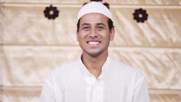 Muslim man smiling