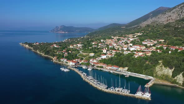 Small marina with catamaran yachts and sailboats in Greece. Kalamos Marina. Beautiful and cozy harbo