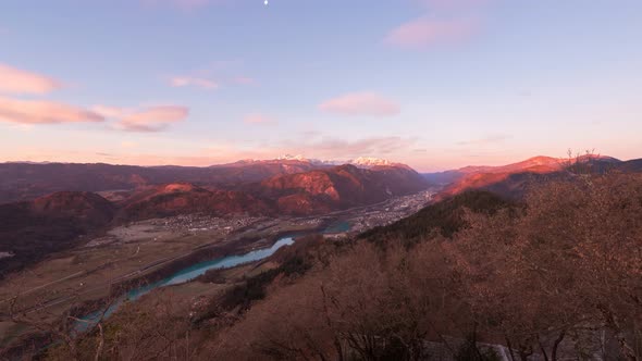 Ajdna Triglav Sunrise With Vivid Clouds And Traffic In The Valley