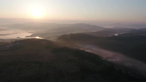 Aerial View of Bonny Glen in County Donegal with Fog  Ireland