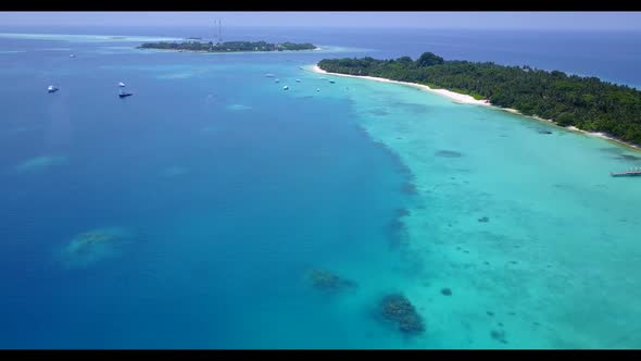 Aerial seascape of perfect lagoon beach adventure by blue green sea and clean sandy background of a 