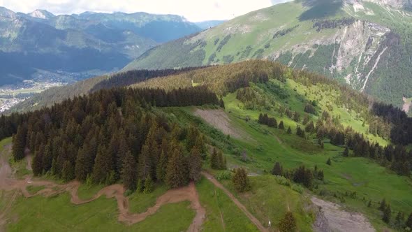 Drone Shot ing forward) of Mountain Bike Trails, Forests and Mountains