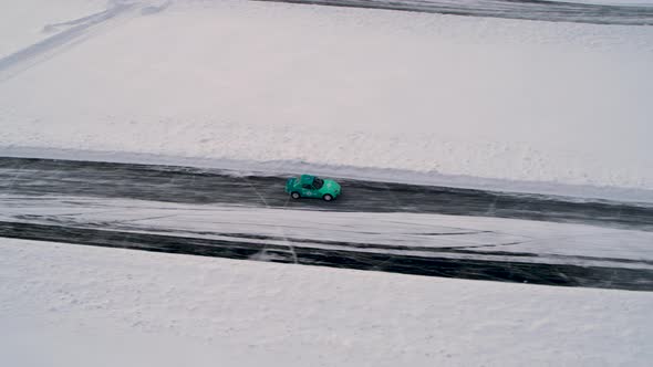 Aerial View of a Racing Car at an Ice Rally