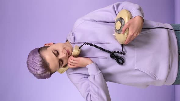 Vertical Shot Young Woman Holding Corded Phone Dialing Number Indoors