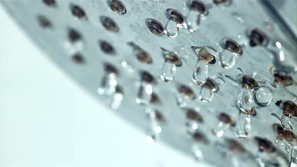 Drops of Water Fall From the Shower Head