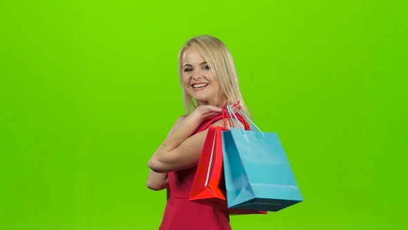 Happy Shopping Woman Excited and Cheerful, Green Screen Studio