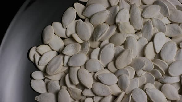 Cinematic, rotating shot of pumpking seeds - PUMPKIN SEEDS 023