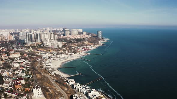 Aerial View of Sea Coast Line Near the City Buildings