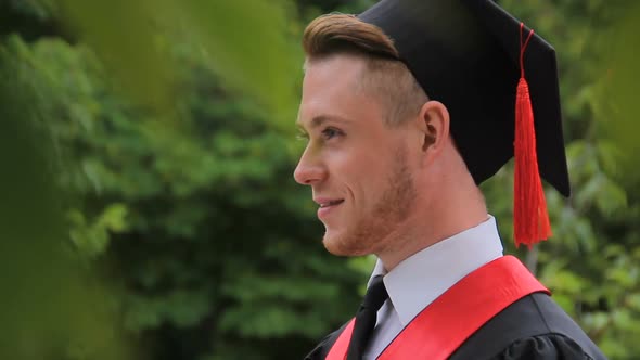 Young Happy Graduate Student Smiling and Posing for Camera, Photoshoot