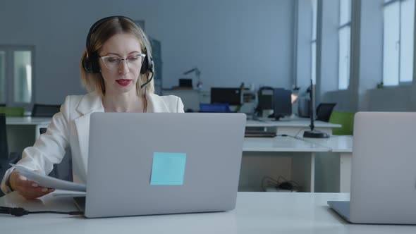 Close Up View of Young Woman That Sits on an Computer