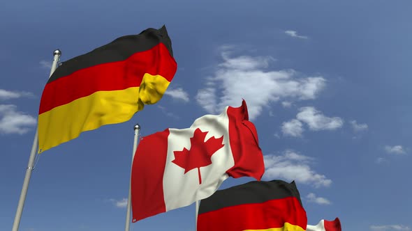 Row of Waving Flags of Canada and Germany