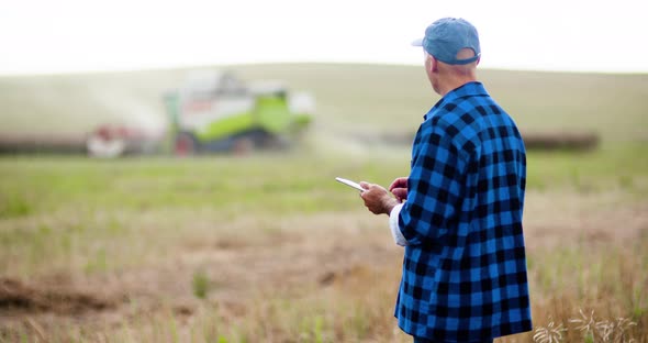 Agriculture Farmer Examining Field Modern Farming