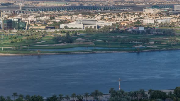 View of Park Near Canal and Buildings in Luxury Dubai City United Arab Emirates Timelapse Aerial