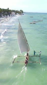 Boat Boats in the Ocean Near the Coast of Zanzibar Tanzania Slow Motion Vertical Video