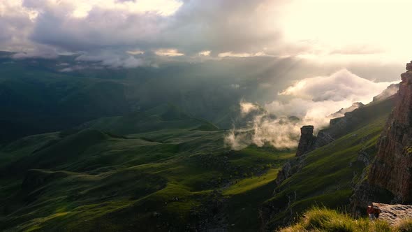 Low Clouds Over a Highland Plateau in the Rays of Sunset