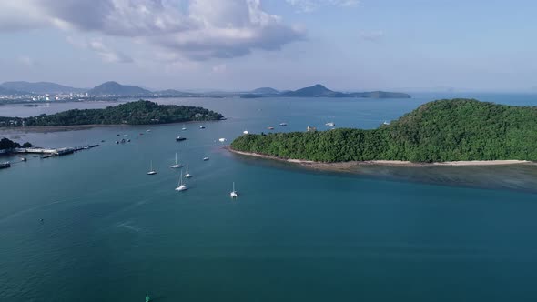 Aerial view of the tropical sea beautiful sea surface in blue ocean at phuket sea Thailand