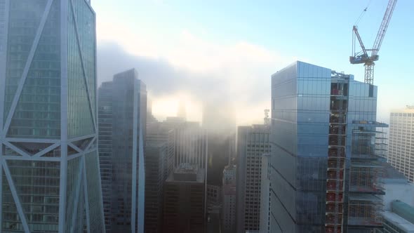 The Cluster of High-rise Towers in a Foggy Morning.