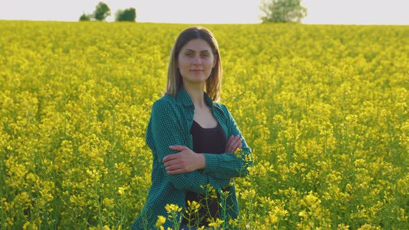 Smiling Farmer Woman Standing Yellow Flowering Rapeseed Crossed Her Arms