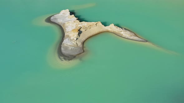 Drone View of the Turquoise Lake Formed As a Result of Mining Waste