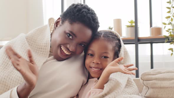 Afro American Mom Mother African Woman Adult Young Parent Hugs Cuddles Beloved Little Girl Black