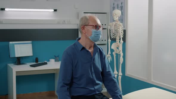 Portrait of Male Patient Waiting to Do Consultation with Doctor