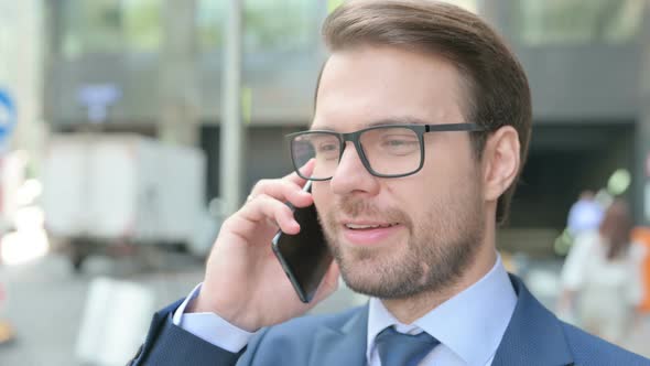 Close up of Businessman Talking on Smartphone, Outdoor