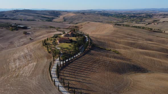 Crete Senesi Tuscan Rolling Hills and Cypress Road Aerial View in Tuscany