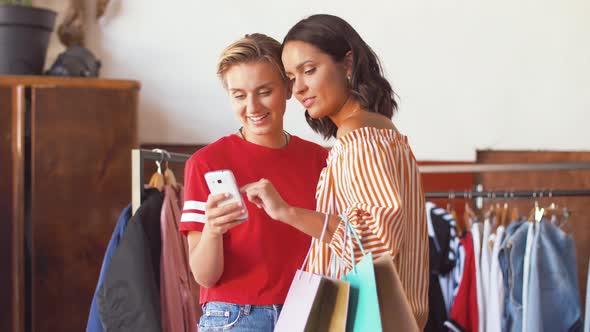 Women with Smartphone at Vintage Clothing Store 47