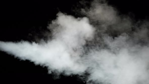 Water Vapor. White Jet of Vapour Steam Under Pressure on Black Background 